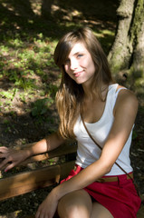 attractive young woman in park