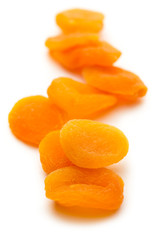 Dried apricots on white background