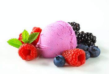 Fruit ice cream with fresh mixed berries