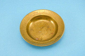 ancient and empty brass plate