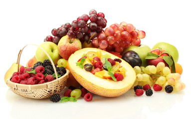 fresh fruits salad in melon, fruits and berries, isolated
