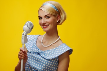 Woman singer in blue dress