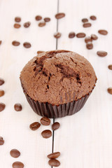 Fresh muffin on wooden background