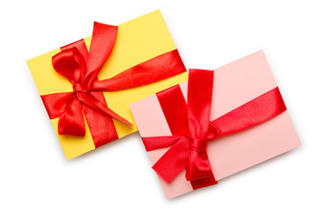 Envelope with colourful ribbon on white