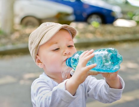 Child Drinking From Bottle