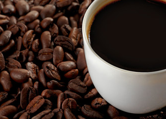 Cup of coffee and coffee beans