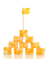 Cheese pyramid isolated on white