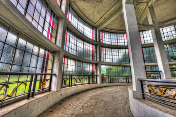 Spiral corridor with large canopy in abandoned sanatorium - obrazy, fototapety, plakaty