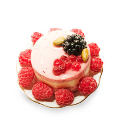 yogurt cranberries cake with raspberries isolated on white
