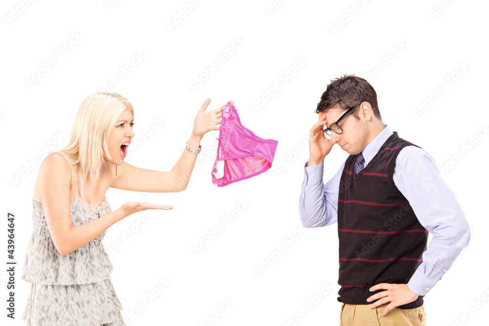 Sticker Angry girlfriend shouting at her boyfriend and holding knickers