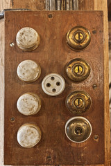 Old switches on a wooden box
