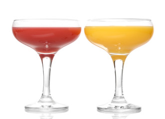 Tropical juices in glasses isolated on white