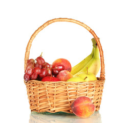 Ripe fruits in basket isolated on white