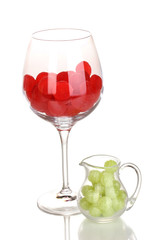 Color candies in glasses isolated on white