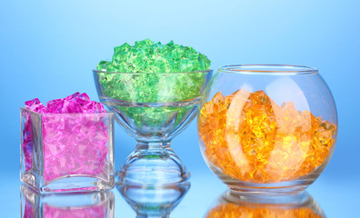 A glasses with colorful decorative stones