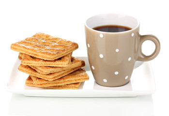 Cup of tea and cookies isolated on white