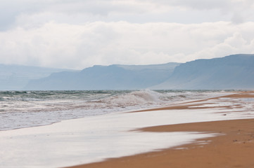 sand beach and the mountains