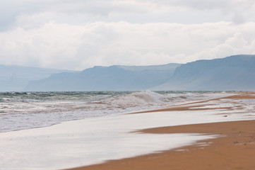 Obraz premium sand beach and the mountains