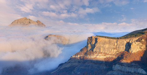 Foggy autumn morning at the high cliffs