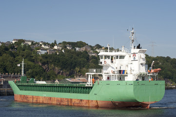 cargo ship leaving dock