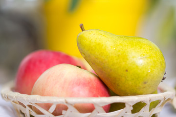 fresh pear  and aple fruits with green leaf