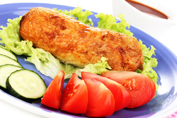 Tasty meat cutlet with garnish on plate
