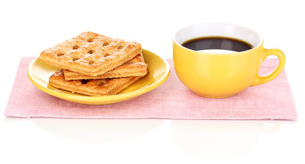 Cup of tea and cookies isolated on white