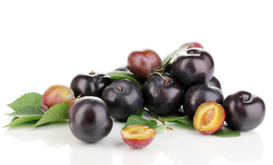 Rip plums isolated on white