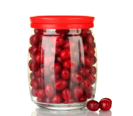fresh cornel berries in glass jar isolated on white