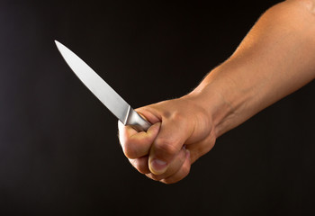 Hand with knife