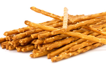 Close up of a pile of pretzel sticks isolated on white backgroun
