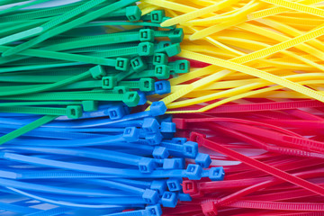 Assortment of colorful plastic cable ties  (zip ties, tie-wraps)