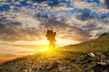 tourist climbing the hill
