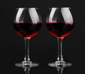 Wineglasses isolated on black