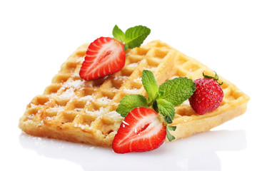 belgium waffles with strawberries and mint  isolated on white