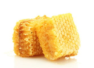 golden honeycombs isolated on white.
