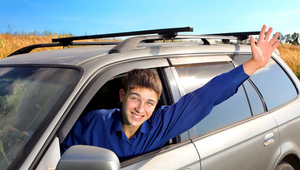 young man in a car