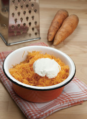 Grated carrot with  sour cream