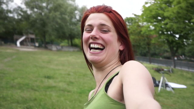 Young Woman spinning and laughing Handheld video