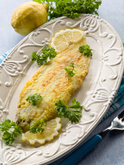 breaded sole fish with parsley and lemon