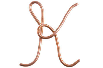 Copper metal wire in the form of letter K, modern US calligraphy