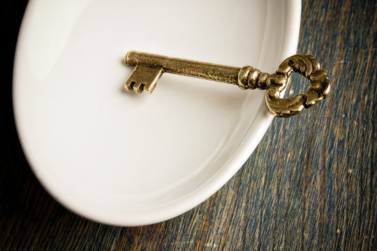 Gold Key in Dish