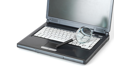 Laptop with a magnify glass