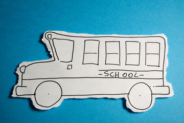 SKETCH made by a child little School bus draw on Cyan