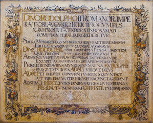 ancient stone with Latin text in upper case