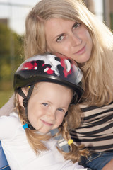 mother and daughter outdoors