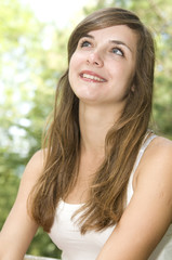 Fototapeta premium smiling girl looking up