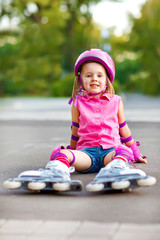 Attractive child in roller skates