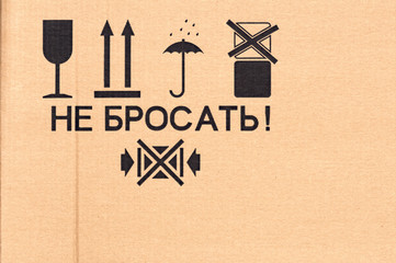 different symbols from cardboard box, information labels