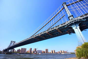 Manhattan Bridge over East River with skyline, New York City